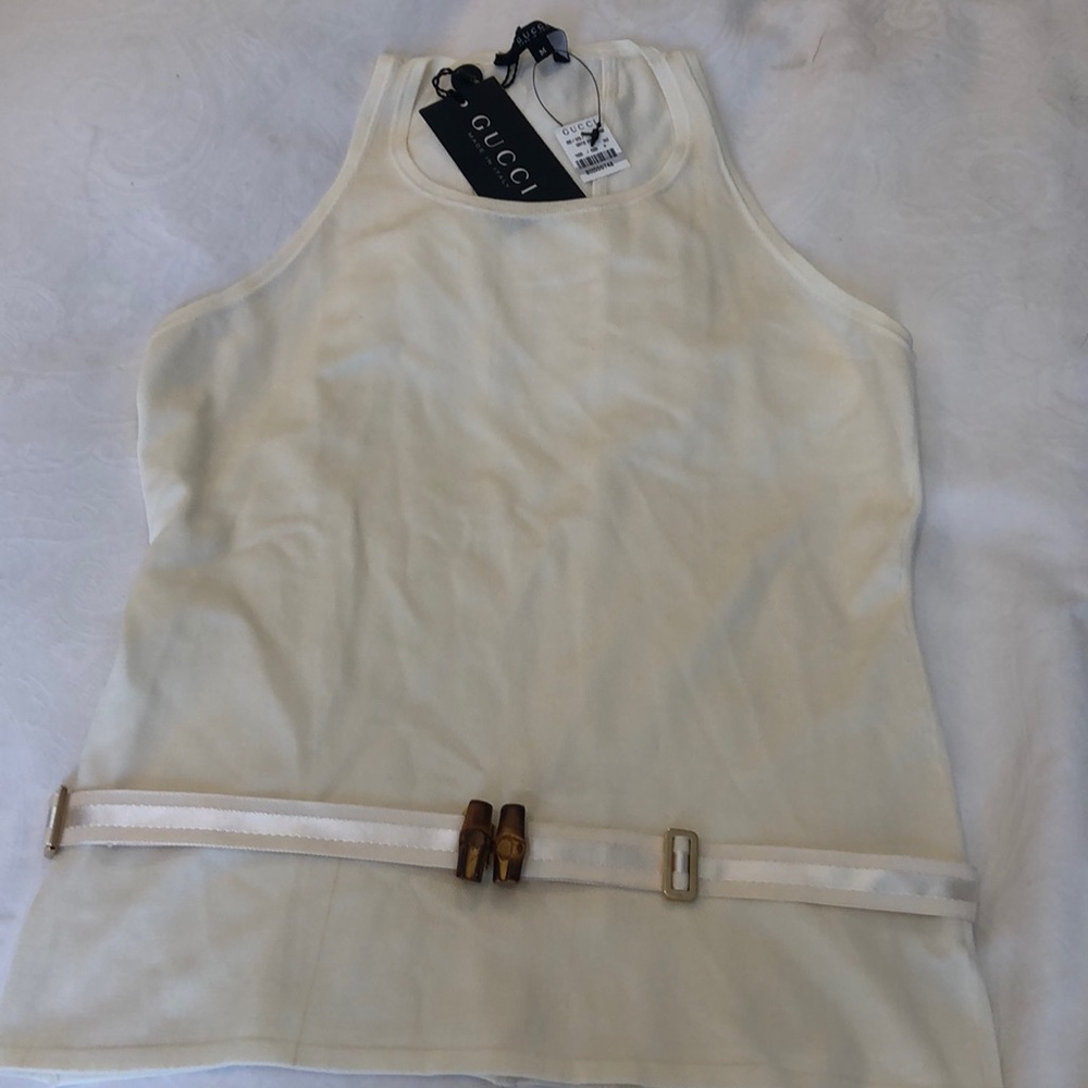 Gucci crean sleveless with cream silk belt.